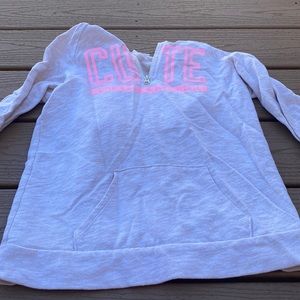 Light color sweater.